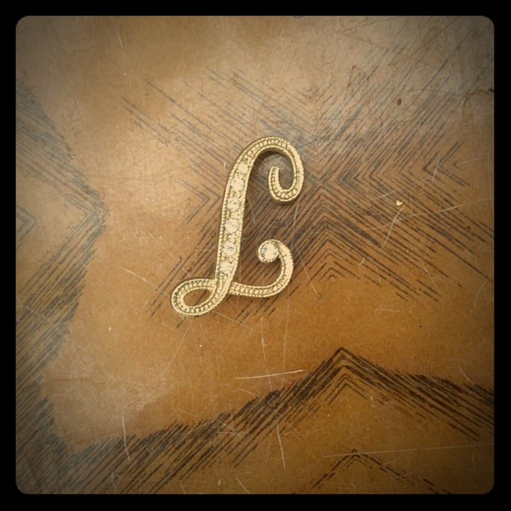 L monogram brooch